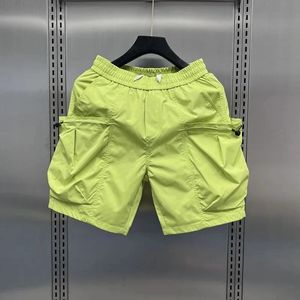 Vêtements pour hommes été couleur bonbon Baggy Shorts Cargo pantalon américain fantaisie pantalon rose plage pantalon tout-match poches court Homme 240312