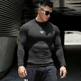 Mens Compression Shirt Running Long Mouw T-shirt Hight Collar Sportswear Sneldrogende elasticiteit Tight Bodybuilding Gym kleding 210421