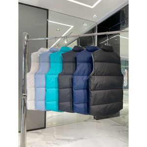 Diseñador para hombre Chaqueta de plumón canadiense Chaleco Abrigos cálidos Mujeres Carta informal Bordado Moda de invierno al aire libre para parejas masculinas Gansos Parkas