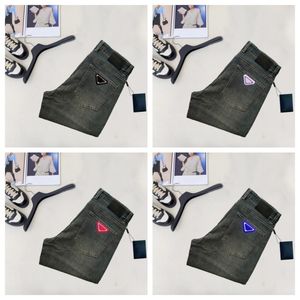 Pantalon en denim de créateur pour hommes Jeans violets Tendances haut de gamme Pantalon de moto de motard déchiré en détresse Pantalon de panneau de broderie pour femmes pour hommes Pantalon de survêtement extensible