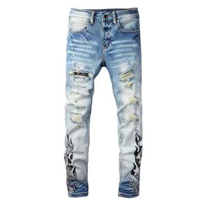 Jeans de créateurs pour hommes Jeans de renouveau rock européen hommes broderie motif déchiré marque à la mode vintage skinny jeans slim pantalon distrresse pour femme