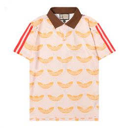 Polo de diseño para hombres Polo de lujo camisas de polo para hombres Diseño de moda de polvo de manga corta ropa casual ropa de verano M3XL RN12