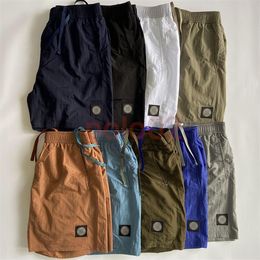 Diseñador de hombres pantalones cortos de verano Pantalones cortos Moda de moda que suelta el proceso de lavado en seco rápido de la tela pura moderna