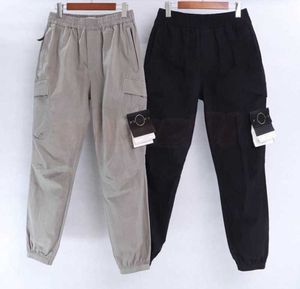 Mens Designer Track Pants Casual Hommes Femmes Hommes Casual Cargo Multi-poches Sarouel Pantalon Mode Hip Hop Taille Élastique Pantalon Sportswear 888y