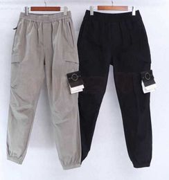 Heren Designer Track Stones Island Pants Dames Casual Cargo Multi-Pocket Harem Trousers Fashion Hip Hop Elastic Taille Sportswear Leisure Trend 559es