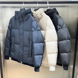 Mens Down Parkas Designer Vêtements Top Qualité Rislerjacket Veste Femmes Manteau Blanc Canard Vestes Normal Badge Hiver Outwear Parka Surdimensionné Lad Ncnf Ncnf Ncnf