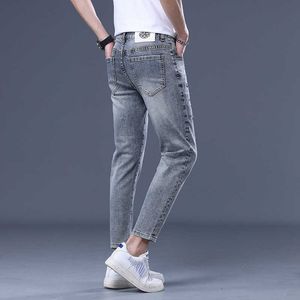 Mens European imprimé jeans Tendance printemps / été 2023 Pantalons longs élastiques slim ajustement
