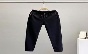 Fashion masculine décontractée plus pantalon pantalon de survêtement pour hommes lâches décoration de poche à fermeture éclair pour jouer à différentes couleurs plusieurs tailles69091735879