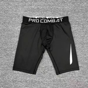 Pantanos cortos de gimnasia pantalones cortos de secado rápido deportes fondos apretados de la ropa de entrenamiento de compresión de baloncesto