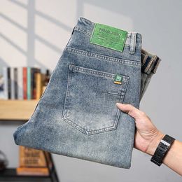 Mens jeans 2024 lente/zomerstijl Guangzhou Xintang Town Slim Fit kleine voet smalle versie rechte been lange broek