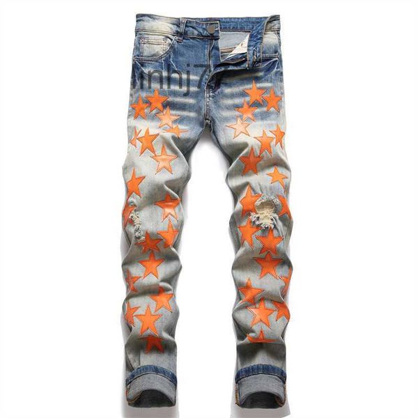 Jeans masculins Amirs Jeans pour hommes pour hommes Ripped avec des étoiles oranges Lettre de coupe régulière Broderie Zipper mouche noire Pantalon de crayon moyen