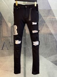 Herenjeans Designer Denim Jeans Alfabetborduurwerk vernietigen Gaten Jean skinny Broek Man motorrijden slanke Denim broek Hiphop straat