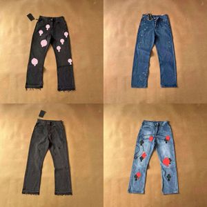 Designer en jeans pour hommes font des vieux pantalons hétéroseurs lavés imprimés de lettre de coeur pour femmes hommes décontractés
