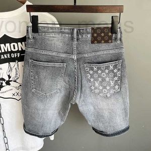 Diseñador de jeans para hombres Celebrador de Internet personalizado Impresión de cinco puntos Falcos de mezclilla para hombres Summer Fino Marca Versátil Corea Corea