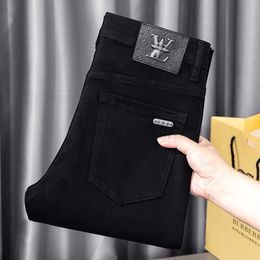 Diseñador de jeans para hombre Jeans de hombres de alta gama Pure Black High-End Autumn and Winter New Light Luxury Small Tube recto Slim Fit Casual Elastic Pants tendencia