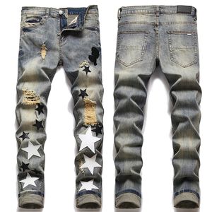Heren jeans ontwerper gescheurd borduurwerk pentagram patchwork voor trend merk motorfiets broek heren mager winter01 580