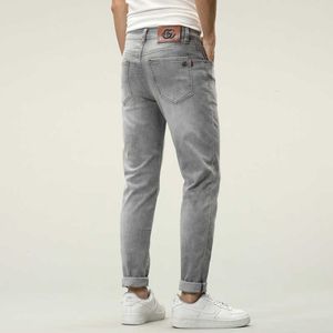 Jeans pour hommes Designer Printemps Été Élastique Slim Fit Luxe Européen Haut de gamme Coréen Gris Petits Pieds Pantalons Longs