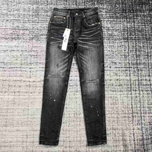 Jeans pour hommes Designer Tears Pantalon Patch Perforé Tendance Élastique Empilé Hommes Polyvalent Pantalons Pour Hommes Crayon Mince F42N