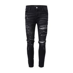 Diseñador de jeans para hombre con agujeros de letras Muslo negro Tobillo rasgado Pantalones rasgados andrajosos Corte de rodilla resistente Trashed Silm Moda Cremallera rugosa recta larga Angustia alta