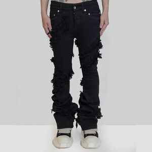 Mens jeans mode wijd uitgelucht gescheurd noodlijdende streetwear zwarte denim broek lange linten trend man