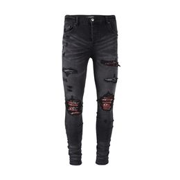 Jeans pour hommes en Europe et en Amérique mode lavage pli design trou patch rouge décontracté collants de pied minces adolescents235u