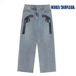 Mens Jeans Mens Vintage Punk Hip Hop Pistola Riveta Pantalones de mezclilla Streetwear 2024 Haruku Casual Jean pantalones Blue