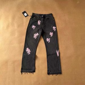 Jeans masculins vintage designer jean coeur collé en cuir collé en cuir vintage bertillant pantalon
