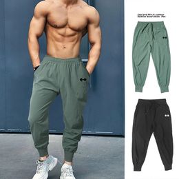 Joggers pour hommes Pantalons d'été Papent de survêtement STRIMPANT STREETWEAR FITNESS Suit Pantalons de jogging pour hommes Vêtements de gymnas