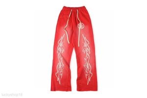 Diseñadores de lujo para hombre Pantalones Hombres Pantsl Hellstar Studios Pantalones acampanados rojos Pantalones deportivos Hombres Jogger Moda Hip Hop Casual