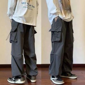 Pantalon homme Cargo décontracté multipoches Streetwear noir Harajuku Hip Hop taille élastique Harem cheville longueur pantalon 230731