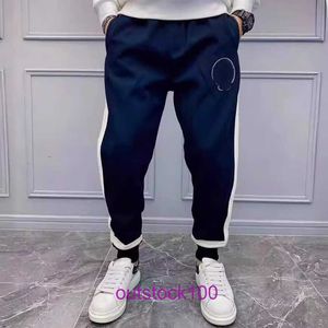 Pantalons masculins Classic Niche Ins Print Mens and Womens 2024 Spring Horseshoe Sanskrit Broidered Brand Guard Guard for Men Women Couple Conical a Labe original