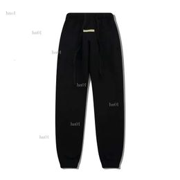 Hommes Pantalons Designer Ess Pantalon Réfléchissant Hommes Femmes Élasticité Hommes Sports Lâche Silocone Lettres Pantalons De Survêtement Cordon Pantalon Casual E5