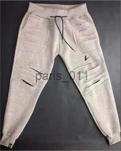 Pantalones para hombre Diseñador Pantalones para hombre Moda Agujeros rasgados Pantalones de chándal Tamaño MXXXL Color sólido Joggers Hombres Mujeres Deporte de alta calidad Pantalones para correr Streetwear Hip Hop Beam Foot