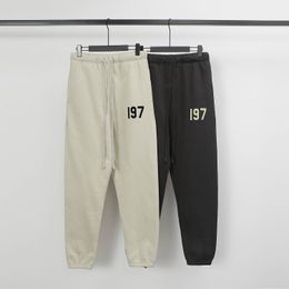 Pantaloni da uomo Uomo famoso Donna Streetwear Pantaloni casual Pantaloni della tuta Piede a trave Aggiungi floccaggio di lana Taglia S-XL