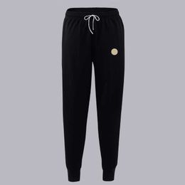 Pantalones pantanos hombres mujeres pantalones de carga pantalones pantalones de marca de la marca