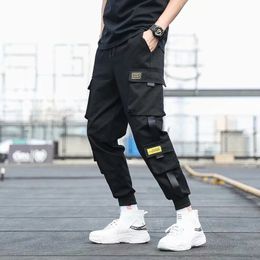 Herenbroeken zijzakken lading haremlinten zwarte hiphop casual mannelijke joggers broek mode streetwear 5xl 230504