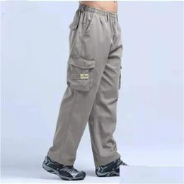 Pantalons pour hommes Couleur unie Streetwear Jambe large avec taille élastique Poches MTI pour un confort décontracté Style respirant Hommes Drop Livraison Appare Dhjcq