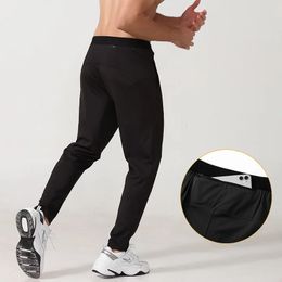 Pantalon pour hommes printemps automne joggeurs joggeurs pantalons sportifs pantalons décontractés gym de fitness respirant 240418