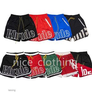 Pantalones cortos Rhude para hombre Pantalones cortos de diseñador Pantalones deportivos para mujer Verano Playa Gimnasio Fitness Estilo extragrande suelto Pantalones