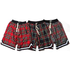 Heren Schotse geruite shorts Mode High Street zijrits Mesh stretch taille Losse vijf shorts Bieber Trend Short