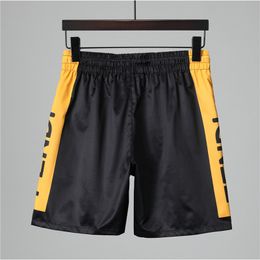 Shorts pour hommes Mode décontractée StreetWear Maillots de bain Designer Marque Lettres Imprimé Summer Board Beach Boxer Pantalon Cordon avec doublure en maille Brea