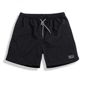 Shorts pour hommes pantalon de plage lâche décontracté shorts de couleur unie légère et séchage rapide