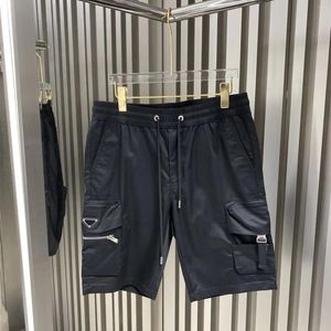 Shorts pour hommes cinessd la personnalité de la mode d'été triangle Mark Multi-poche de travail multi-poche 2024 lacets lâches