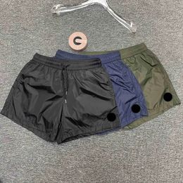 Pantalones cortos para hombre Diseñador para mujer Pantalones cortos de natación de verano Francia Deportes de lujo Pantalones cortos de frenillo de playa transpirables con interior de malla