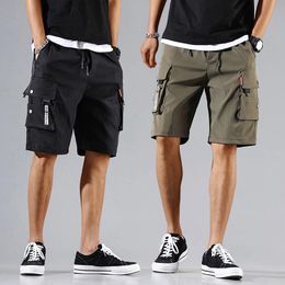 Heren shorts mannen vracht tactische joggers werken casual broek mannelijke multi -zakken knoppen losse wijdbeen knie lengte zomer 230522