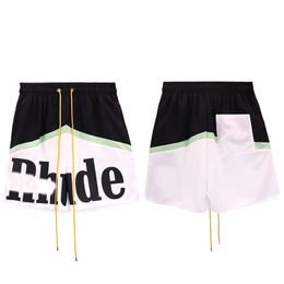 heren shorts rhude designer shorts mesh shorts Zwart-witte kleurblokken Amerikaanse straatbroek broek met letterprint