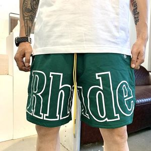 Heren shorts Rhude Designers Basketball Korte luxe Luxurys Zomerstrand Palmbrief Mesh Street Fashion Sweatpants