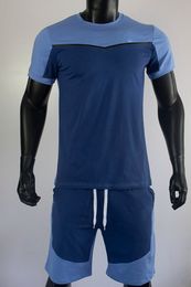 Camiseta de algodón de verano para hombres y pistas cortas logotipo estampado empalmando múltiples colores pantalones deportivos casuales pantalones de moda de ocio y camisetas nk