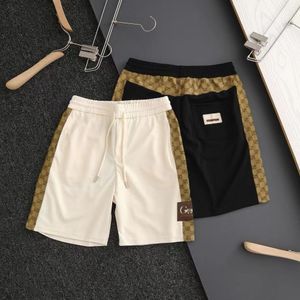 Mens zijde klassieke oude bloemen korte beperkte co -branden serie drie normen hetzelfde model van mannen en vrouwen kwaliteitsborging beige zwarte shorts logo borduurwerk