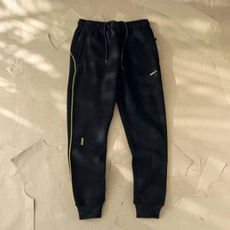 Mens Sports Nocta Tracksuit Designer Tech Fleece Pantalon Sweat à capuche GLIDE GOLF FEMME VETTES PUCHER